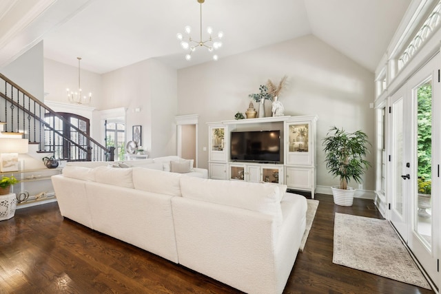 624 Twin View Dr, Murfreesboro, TN 37128 - living area featuring a chandelier, stairs, high vaulted ceiling, healthy amount of natural light, and dark wood finished floors
