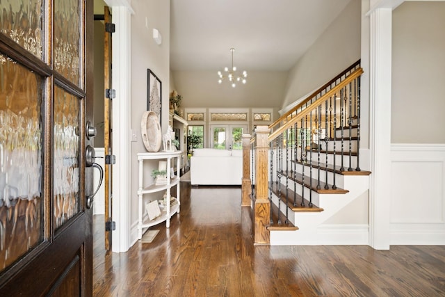 624 Twin View Dr, Murfreesboro, TN 37128 - foyer entrance with wood finished floors, stairs, a chandelier, a wainscoted wall, and a decorative wall