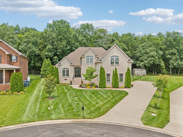 624 Twin View Dr, Murfreesboro, TN 37128 - view of front facade with a front lawn, brick siding, and concrete driveway
