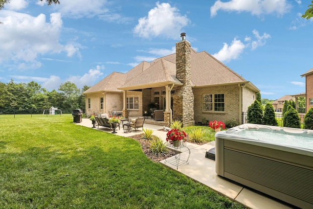 624 Twin View Dr, Murfreesboro, TN 37128 - back of property with a hot tub, a patio, brick siding, a chimney, and outdoor lounge area