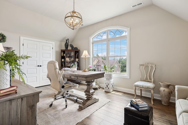 624 Twin View Dr, Murfreesboro, TN 37128 - home office featuring lofted ceiling, healthy amount of natural light, a chandelier, and wood finished floors