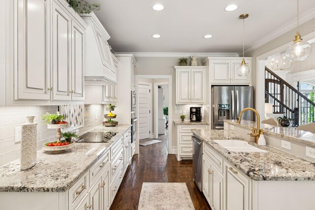 624 Twin View Dr, Murfreesboro, TN 37128 - kitchen featuring stainless steel appliances, dark wood-style flooring, tasteful backsplash, decorative light fixtures, and white cabinets