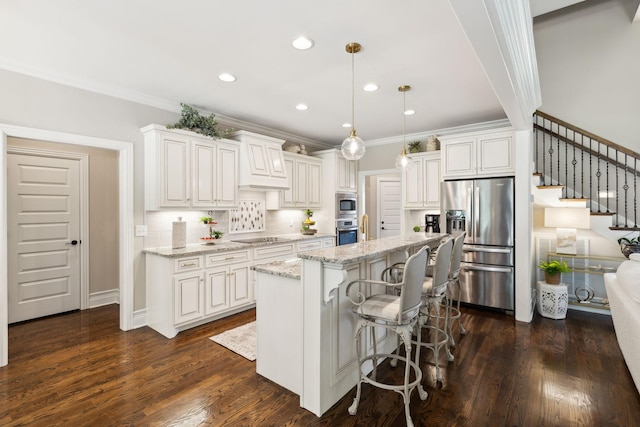 624 Twin View Dr, Murfreesboro, TN 37128 - kitchen featuring stainless steel appliances, a kitchen island, white cabinetry, light stone countertops, and tasteful backsplash