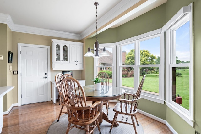 395 Glendower Pl, Franklin, TN 37064 - dining area featuring light wood-style flooring and ornamental molding