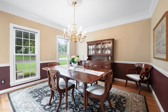 395 Glendower Pl, Franklin, TN 37064 - dining room featuring a chandelier, ornamental molding, and wood finished floors
