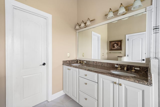 395 Glendower Pl, Franklin, TN 37064 - bathroom featuring double vanity and marble finish flooring