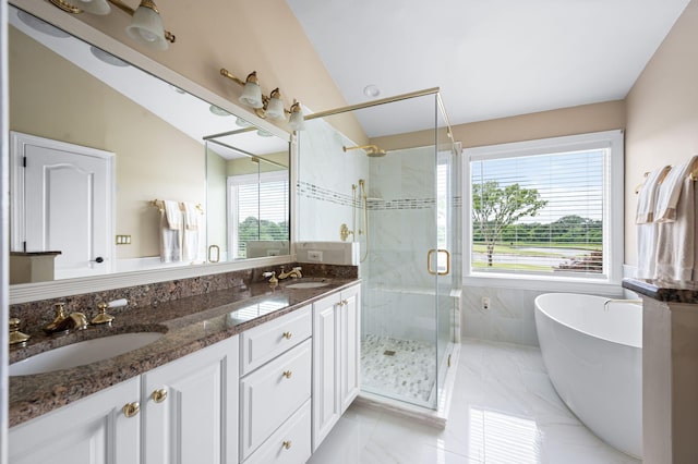395 Glendower Pl, Franklin, TN 37064 - bathroom with a shower stall, a soaking tub, double vanity, vaulted ceiling, and marble finish flooring