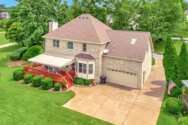 395 Glendower Pl, Franklin, TN 37064 - view of front of property with a chimney, roof with shingles, a wooden deck, concrete driveway, and a front lawn