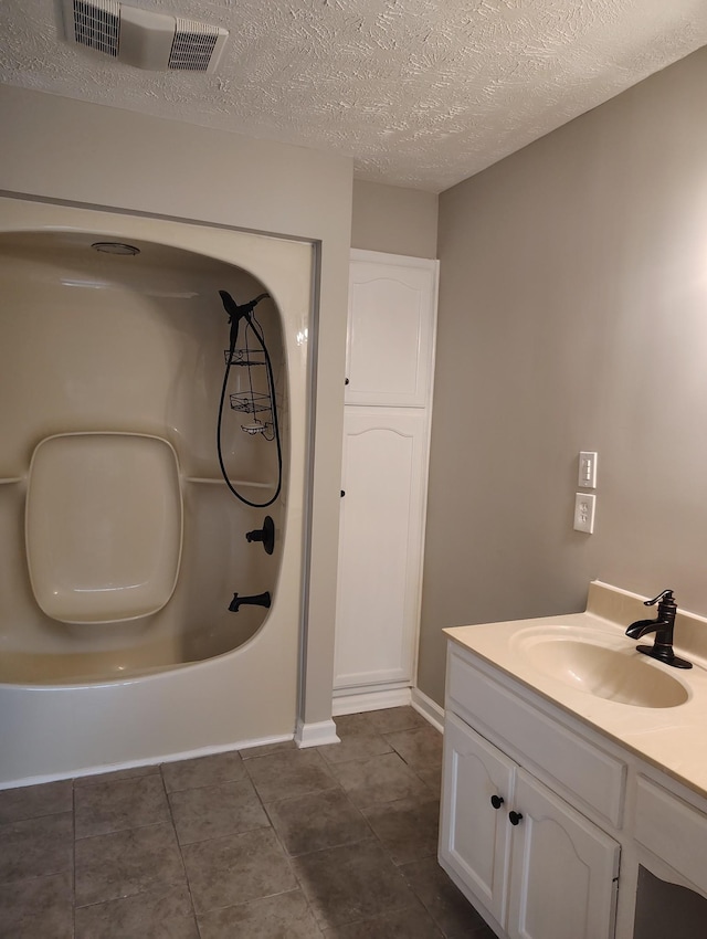 631 Mag A Mor Dr, Lafayette, TN 37083 - full bathroom featuring vanity, a textured ceiling, and tile patterned floors