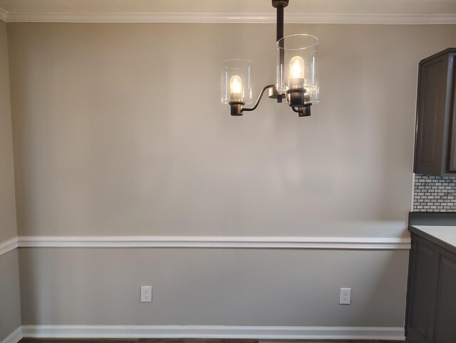 631 Mag A Mor Dr, Lafayette, TN 37083 - unfurnished dining area with a chandelier and ornamental molding
