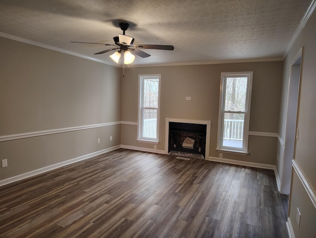 631 Mag A Mor Dr, Lafayette, TN 37083 - unfurnished living room featuring dark wood-style flooring, a ceiling fan, a fireplace, a textured ceiling, and ornamental molding