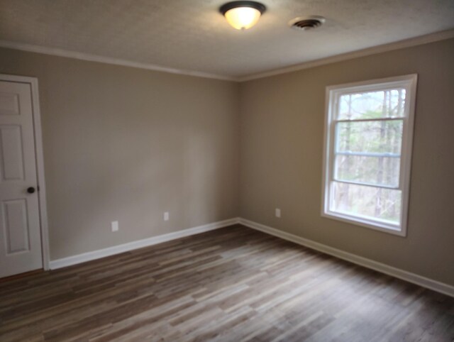 631 Mag A Mor Dr, Lafayette, TN 37083 - spare room with ornamental molding and wood finished floors