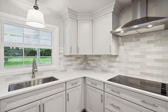 1061 Alford Rd, Murfreesboro, TN 37129 - kitchen with wall chimney exhaust hood, tasteful backsplash, white cabinets, light countertops, and decorative light fixtures