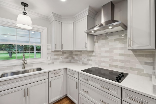 1061 Alford Rd, Murfreesboro, TN 37129 - kitchen featuring wall chimney range hood, black electric cooktop, tasteful backsplash, white cabinets, and light countertops