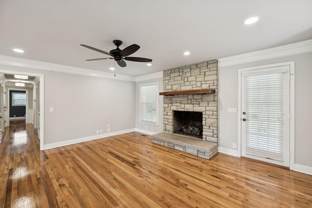 1061 Alford Rd, Murfreesboro, TN 37129 - unfurnished living room featuring a ceiling fan, ornamental molding, a fireplace, wood finished floors, and recessed lighting