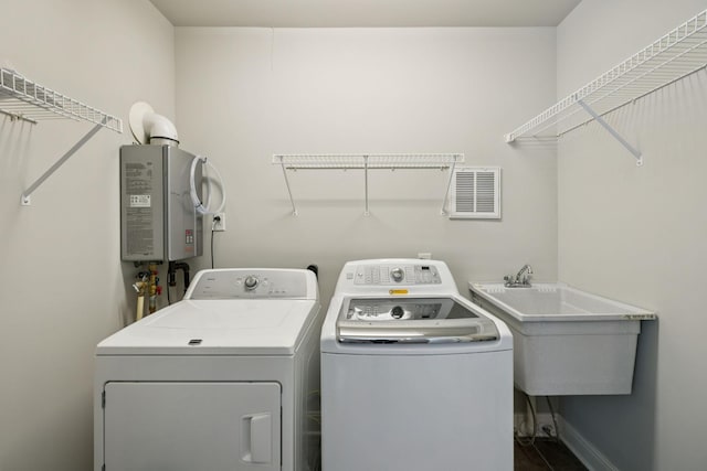 1061 Alford Rd, Murfreesboro, TN 37129 - laundry room featuring washer and clothes dryer and baseboards
