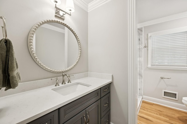 1061 Alford Rd, Murfreesboro, TN 37129 - bathroom with crown molding, vanity, a stall shower, and wood finished floors
