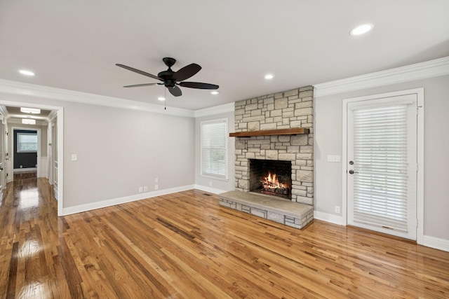 1061 Alford Rd, Murfreesboro, TN 37129 - unfurnished living room featuring ceiling fan, crown molding, a fireplace, wood finished floors, and recessed lighting