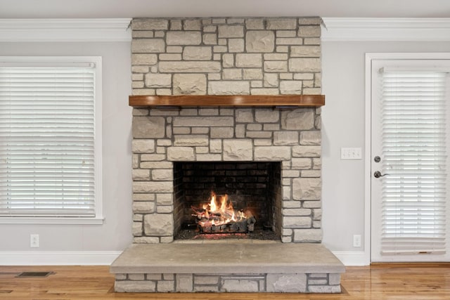 1061 Alford Rd, Murfreesboro, TN 37129 - detailed view of a fireplace, ornamental molding, and wood finished floors