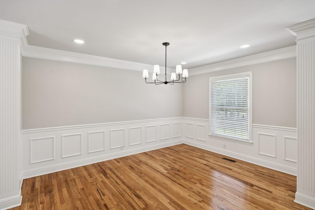 1061 Alford Rd, Murfreesboro, TN 37129 - spare room with a chandelier, light wood-type flooring, wainscoting, crown molding, and recessed lighting