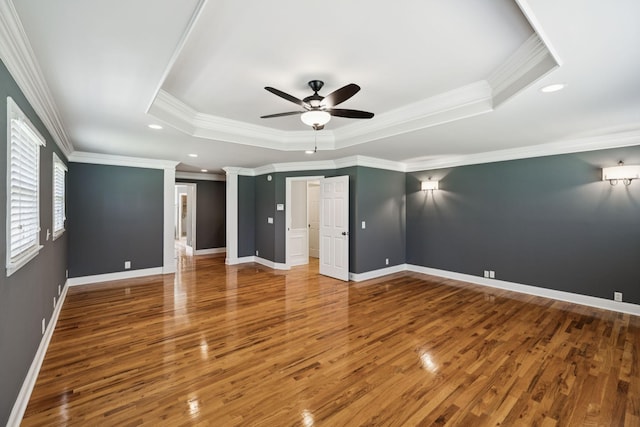 1061 Alford Rd, Murfreesboro, TN 37129 - empty room featuring a raised ceiling, a ceiling fan, wood finished floors, crown molding, and recessed lighting
