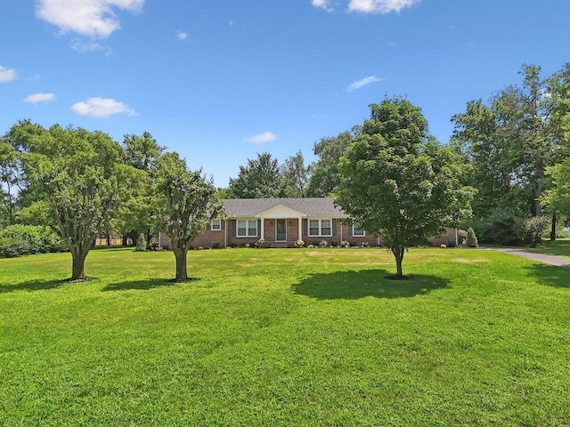 1061 Alford Rd, Murfreesboro, TN 37129 - single story home featuring a front yard and brick siding