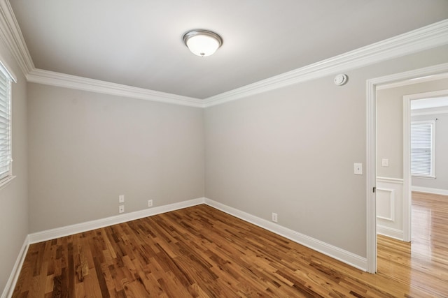 1061 Alford Rd, Murfreesboro, TN 37129 - empty room with wood finished floors, crown molding, healthy amount of natural light, and a smoke detector