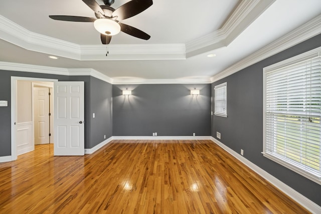 1061 Alford Rd, Murfreesboro, TN 37129 - empty room featuring a tray ceiling, wood finished floors, ceiling fan, crown molding, and recessed lighting