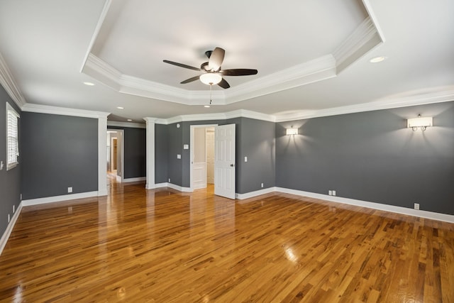 1061 Alford Rd, Murfreesboro, TN 37129 - empty room featuring a tray ceiling, ceiling fan, crown molding, wood finished floors, and recessed lighting