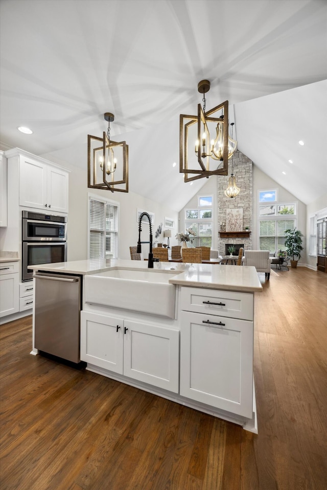 773 Curve St, Chattanooga, TN 37405 - kitchen featuring a chandelier, appliances with stainless steel finishes, open floor plan, vaulted ceiling, and recessed lighting