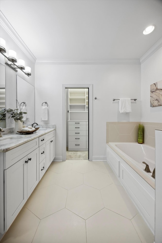 773 Curve St, Chattanooga, TN 37405 - bathroom featuring crown molding, double vanity, a garden tub, and a spacious closet