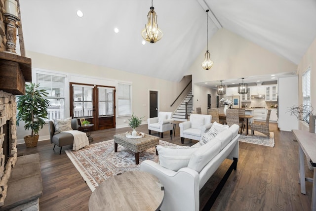 773 Curve St, Chattanooga, TN 37405 - living area featuring high vaulted ceiling, a chandelier, stairs, dark wood-style floors, and recessed lighting