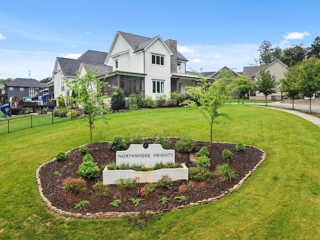 773 Curve St, Chattanooga, TN 37405 - view of front facade with a residential view, board and batten siding, and a sunroom