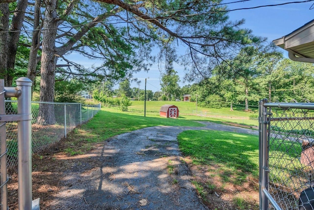5058 New Chapel Rd, Springfield, TN 37172 - view of yard with a storage unit