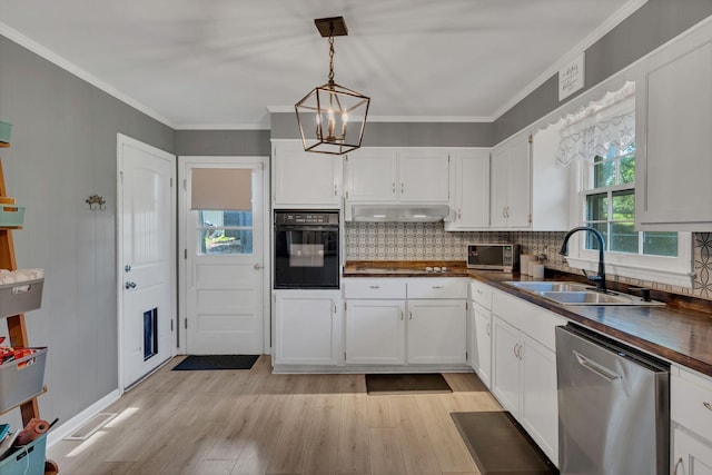 5058 New Chapel Rd, Springfield, TN 37172 - kitchen with black appliances, a chandelier, light wood finished floors, tasteful backsplash, and white cabinets