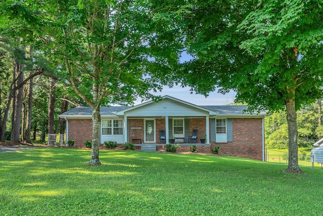 5058 New Chapel Rd, Springfield, TN 37172 - ranch-style house featuring covered porch and brick siding