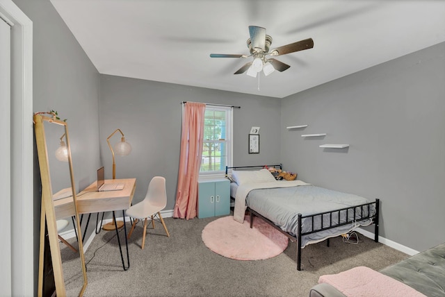 5058 New Chapel Rd, Springfield, TN 37172 - carpeted bedroom with baseboards and ceiling fan