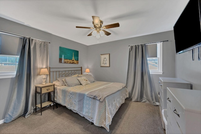 5058 New Chapel Rd, Springfield, TN 37172 - bedroom with multiple windows, carpet floors, and a ceiling fan