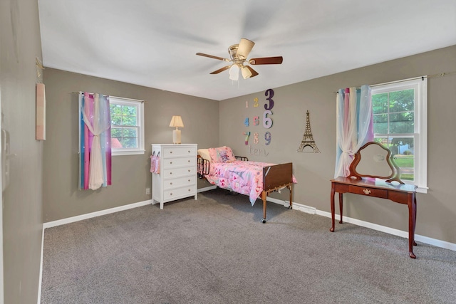 5058 New Chapel Rd, Springfield, TN 37172 - carpeted bedroom with baseboards and a ceiling fan