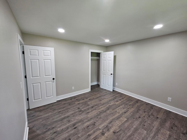 1204 W Lane St, Shelbyville, TN 37160 - unfurnished bedroom featuring dark wood-style flooring, recessed lighting, and a closet