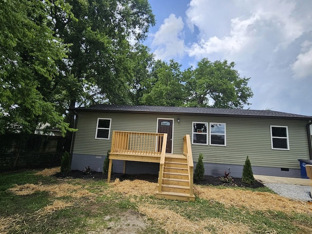 1204 W Lane St, Shelbyville, TN 37160 - view of front of house with crawl space, a deck, and stairway