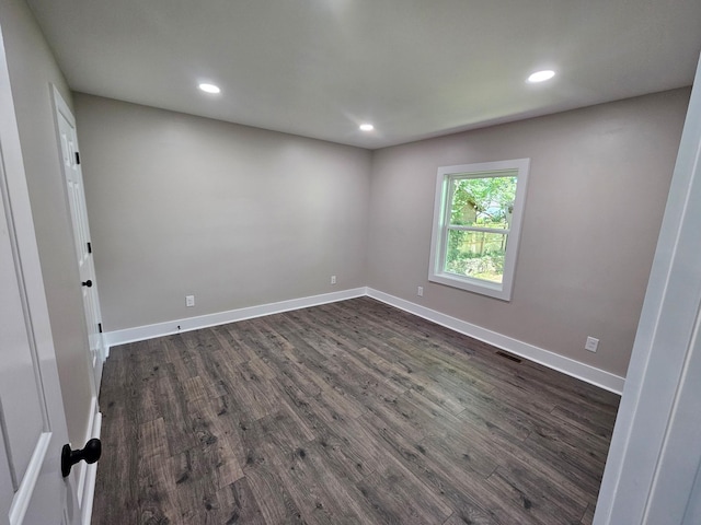 1204 W Lane St, Shelbyville, TN 37160 - unfurnished room featuring dark wood-style floors and recessed lighting