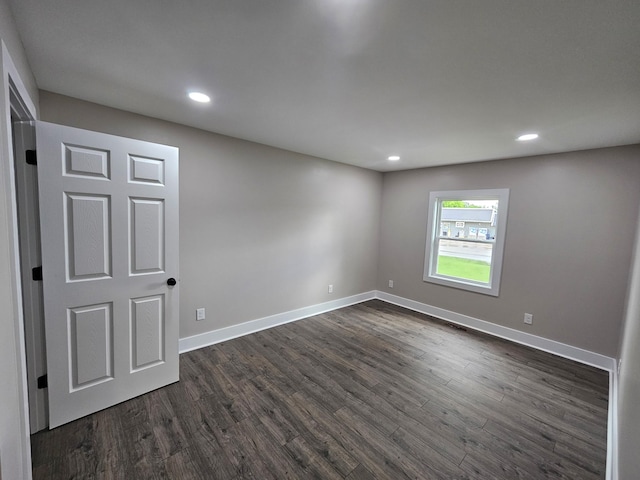 1204 W Lane St, Shelbyville, TN 37160 - empty room featuring dark wood-style flooring and recessed lighting
