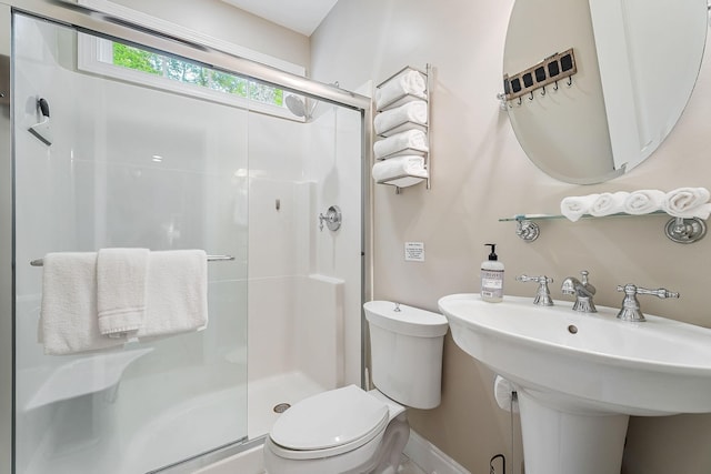 655 Lakeside Dr, Smithville, TN 37166 - bathroom featuring a stall shower and a sink