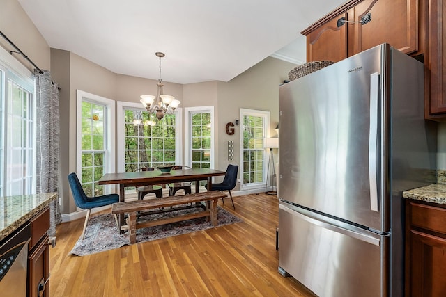 655 Lakeside Dr, Smithville, TN 37166 - dining room featuring light wood-style floors and a chandelier