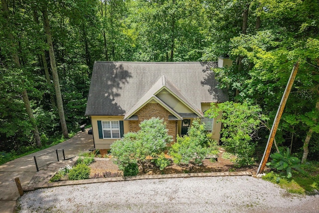 655 Lakeside Dr, Smithville, TN 37166 - view of front of house with a shingled roof and a view of trees
