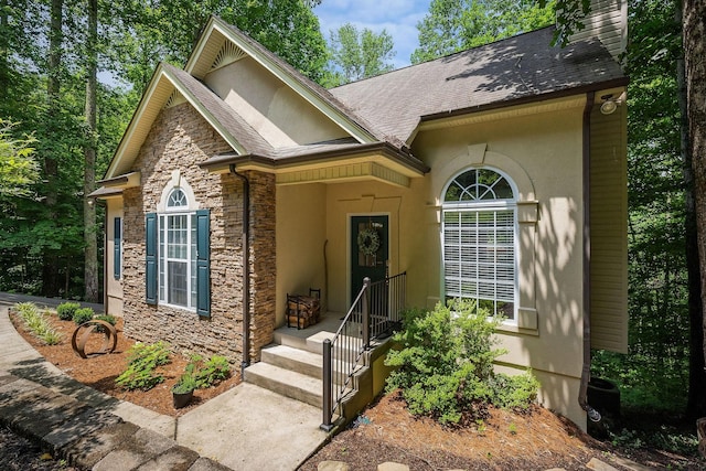 655 Lakeside Dr, Smithville, TN 37166 - view of front facade featuring stone siding, stucco siding, and a shingled roof