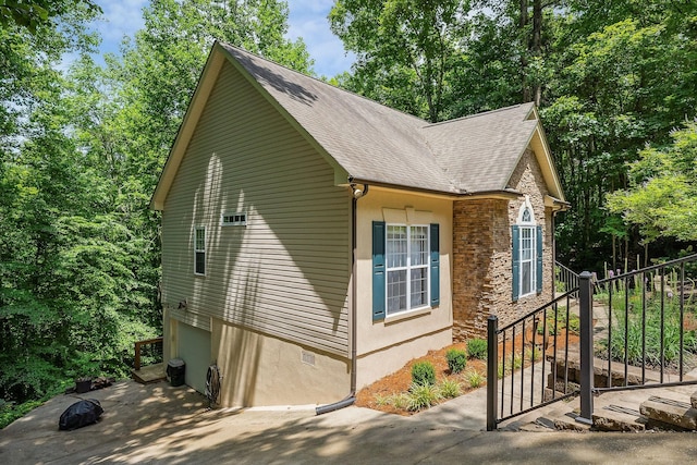 655 Lakeside Dr, Smithville, TN 37166 - view of property exterior with roof with shingles