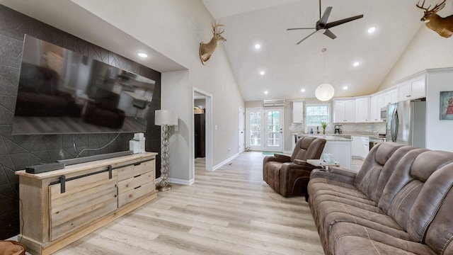 785 Grindstone Hollow Rd, Dickson, TN 37055 - living room featuring light wood finished floors, a ceiling fan, high vaulted ceiling, and recessed lighting