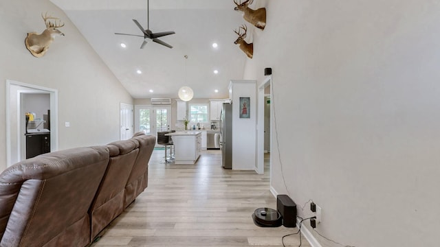 785 Grindstone Hollow Rd, Dickson, TN 37055 - living area with high vaulted ceiling, ceiling fan, light wood-style floors, and recessed lighting
